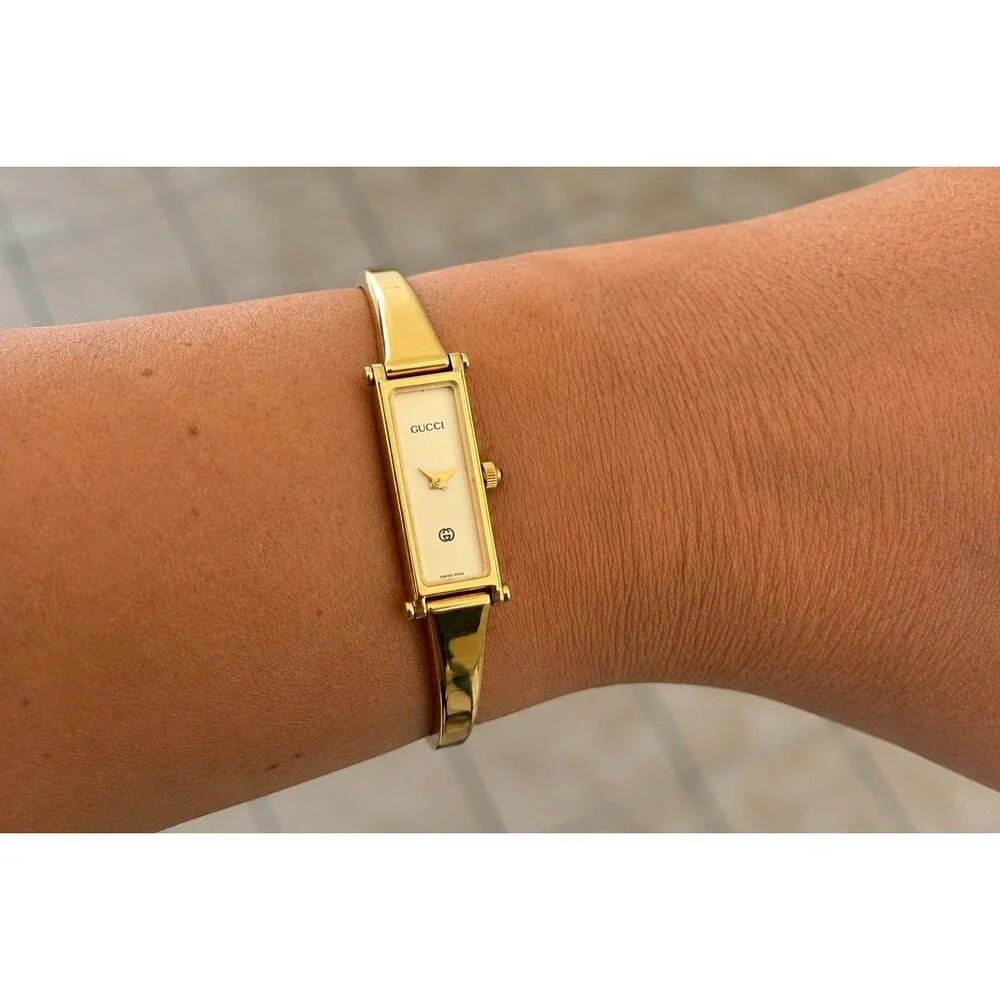 Vintage Gucci 1500L Ladies Gold Tone Bangle Watch Cream Dial Swiss Quartz
